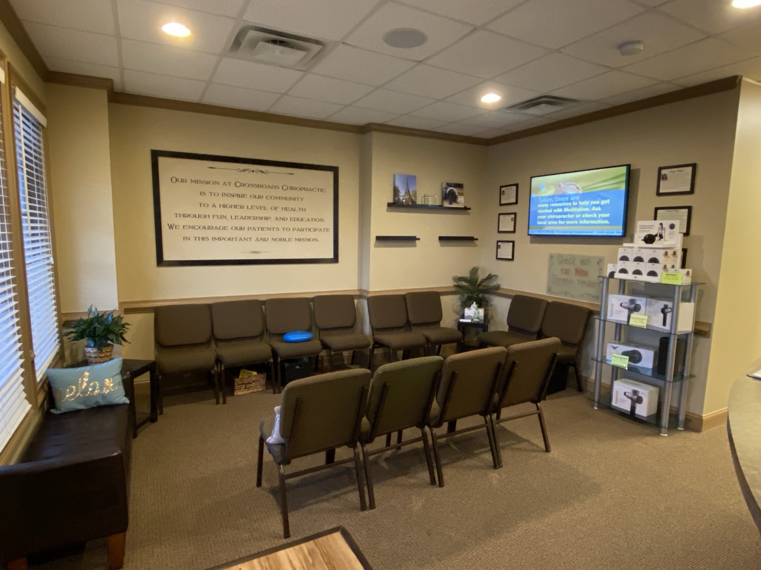 Patient waiting area with seating at Crossroads Chiropractic in Sharpsburg